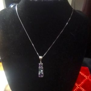 Sterling silver necklace with amethyst pendant
